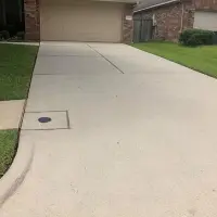 Clean driveway after pressure washing