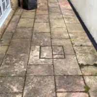 Dirty patio before cleaning